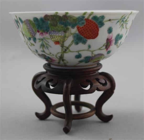 A Chinese famille rose lychees bowl, Guangxu mark and probably of the period (1875-1908), 13.5cm, wood stand